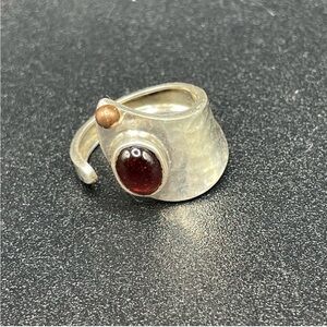 Sterling Silver and Garnet Women's Ring With Small Bronze Dot